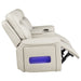 CoasterEveryday Rojas dual power reclining loveseat in greige with built-in Bluetooth speakers