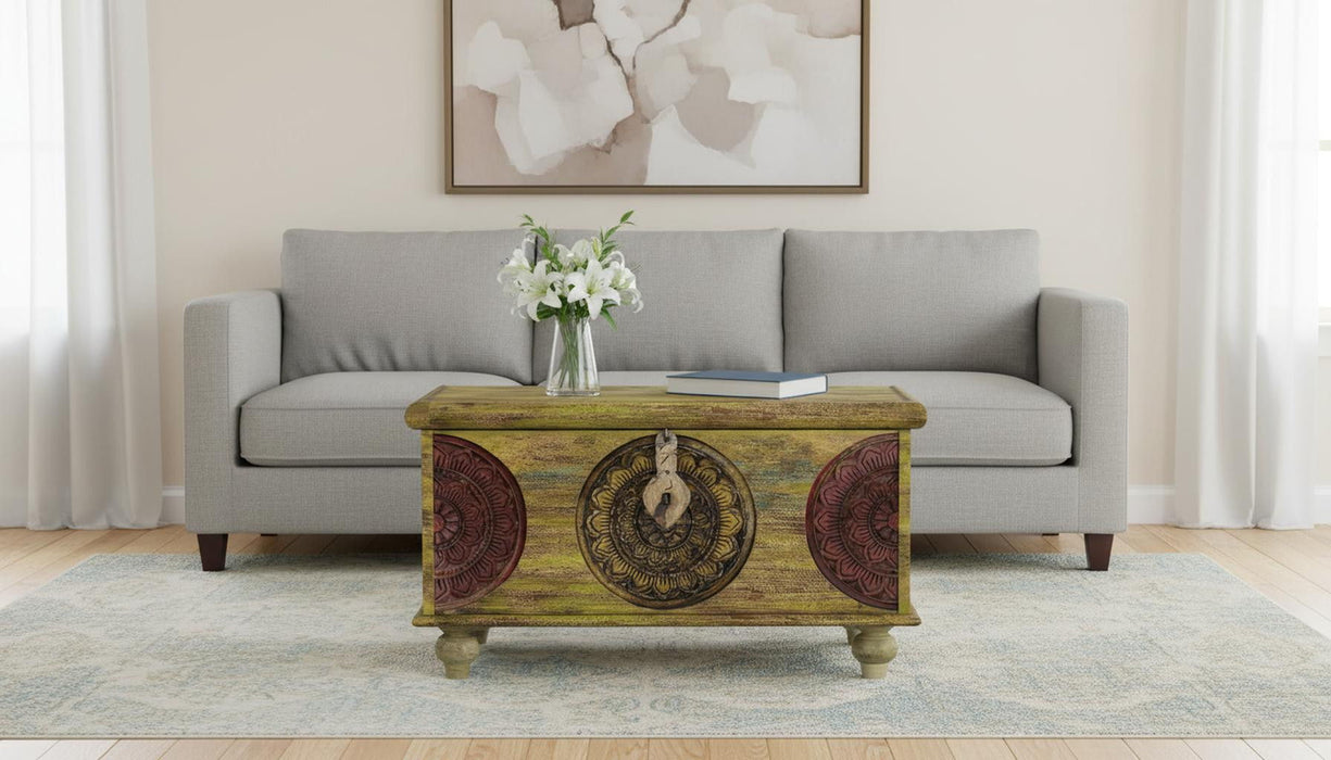 Carved wooden Mesa coffee table by HomeRoots with green and red finish, showcasing detailed carvings and sturdy rectangular design.