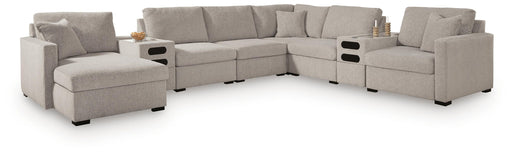 Benchcraft ModMax Luxe 8-piece stationary sectional sofa with plush cushions and modern design, ideal for spacious living rooms.