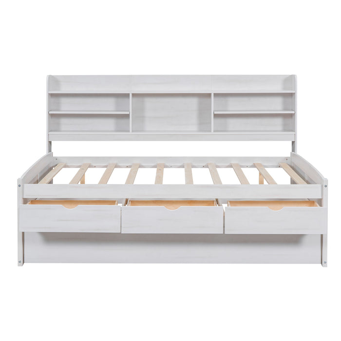 Giga Captain Bed with built-in bookshelves, three storage drawers, and a trundle for extra sleeping space, made of wood.