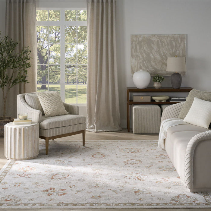 9' X 13' Floral Power Loom Distressed Area Rug With Fringe - Ivory