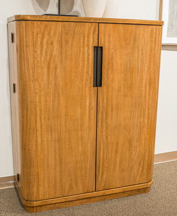 Light brown Pamaria Bar Cabinet by Signature Design Ashley, featuring wine storage and a stylish, modern design.