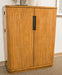 Light brown Pamaria Bar Cabinet by Signature Design Ashley, featuring wine storage and a stylish, modern design.