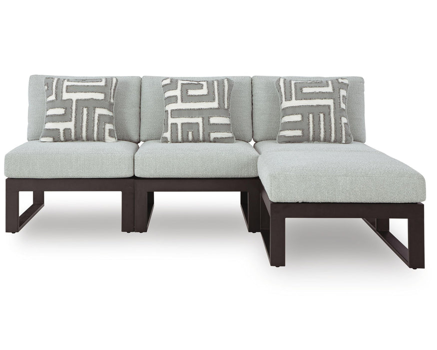 Signature Design by Ashley outdoor Beachloft stationary sectional with cushioned seats and weather-resistant wicker, ideal for patio lounging.