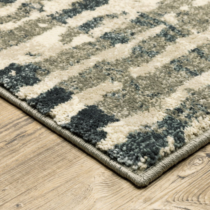 10' x 13' Abstract Power Loom Stain Resistant Area Rug - Blue And Beige