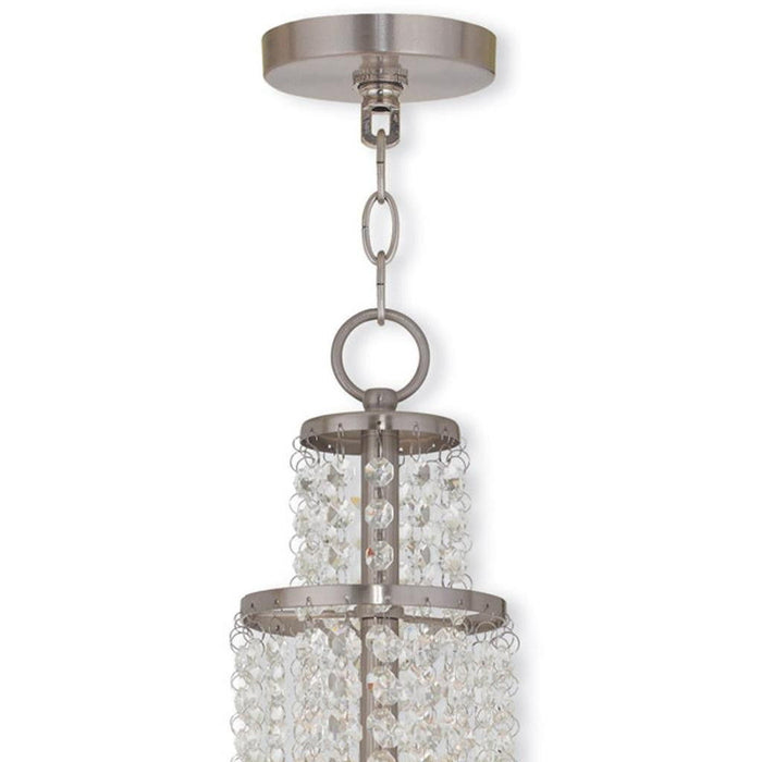 HomeRoots 22-inch three-light metal chandelier with shades in nickel, clear, and off-white, featuring dimmable lighting for elegant decor