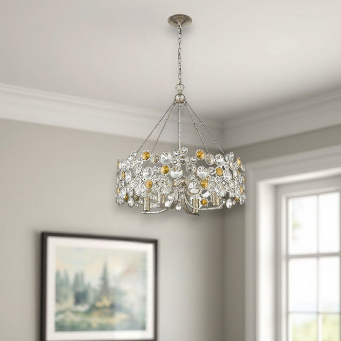 Silver metal chandelier with four shaded crystal lights, dimmable HomeRoots chandelier for elegant lighting.