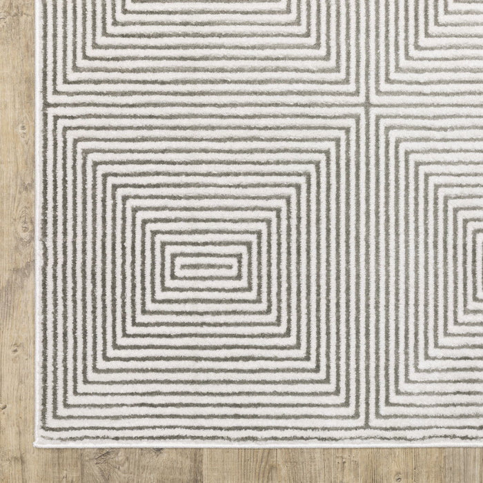 8' x 11' Geometric Power Loom Stain Resistant Area Rug - Gray And White