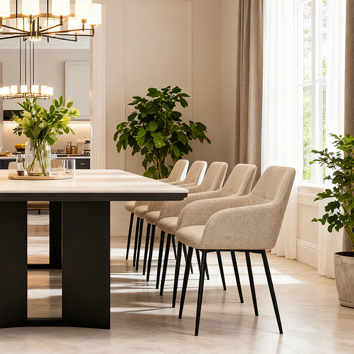 Set of two beige Giga dining chairs with backrests and wide seats, ideal for modern kitchen or dining room decor.