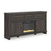 Signature Design by Ashley Brazen Valley TV stand with built-in fireplace, featuring a modern wood finish and spacious storage.