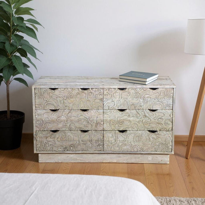 57" Carved Geometric Solid Wood Six Drawer Dresser - White