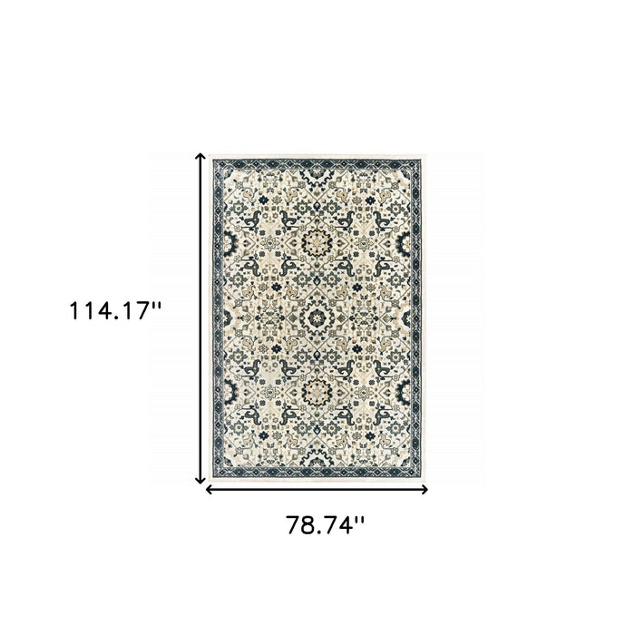 6' x 9' Oriental Power Loom Stain Resistant Area Rug - Ivory Navy And Gold