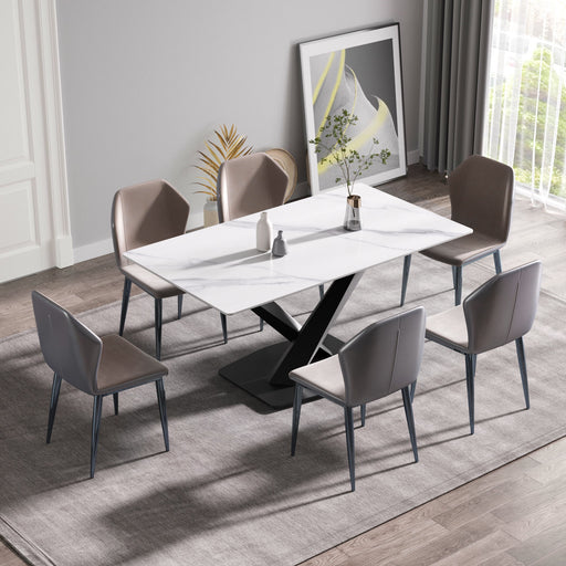 Modern 63-inch Giga artificial stone dining table with metal X-legs, white and black color, seats 6 people.