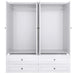 White 71-inch carved geometric mirror wardrobe with four doors and four drawers, by HomeRoots, showcasing intricate design details.