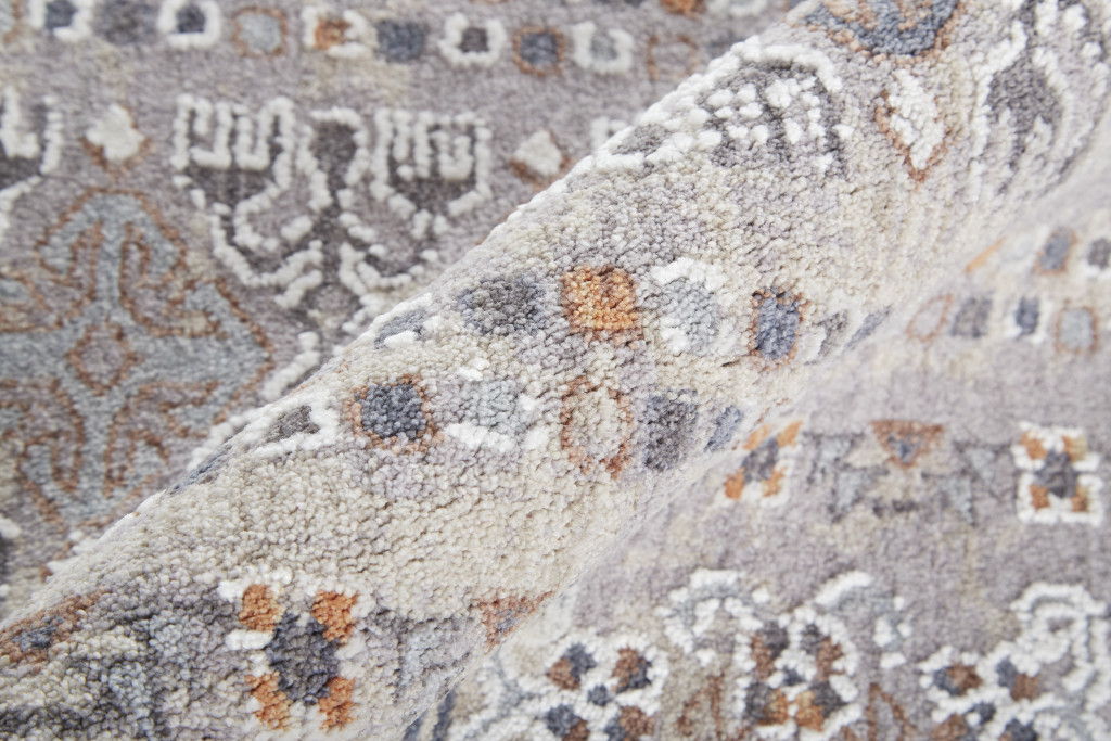 9' x 12' Geometric Power Loom Distressed Stain Resistant Area Rug - Orange Gray And White
