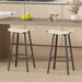 Set of 2 Giga counter height backless bar stools with woven cream fabric, round footrests, ideal for kitchen or dining areas.