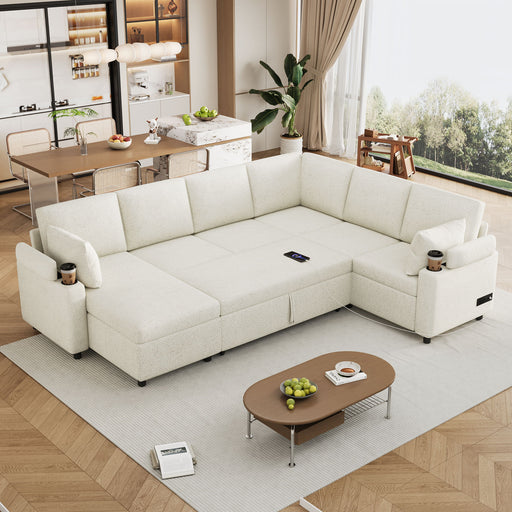 Giga U-shaped sectional sleeper sofa with built-in storage, two cup holders, and charging ports in a modern living room setting.