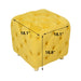 Giga modern upholstered ottoman serving as a small end table and soft foot stool in living room, bedroom, or entrance.