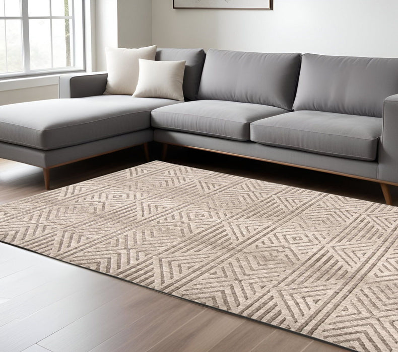 8' x 10' Geometric Stain Resistant Area Rug - Tan Ivory And Brown