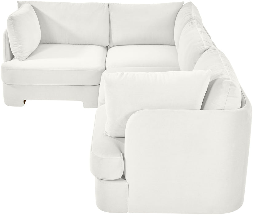 Meridian Furniture velvet performance fabric upholstered 4-piece stationary sectional sofa with plush cushions and modern design.