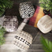 Beige TOV Furniture Yorba cotton accent pouf with round shape and soft fabric for versatile home decor.