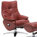 Red genuine leather tufted manual swivel recliner with matching ottoman by HomeRoots, showing plush upholstery and stylish design.