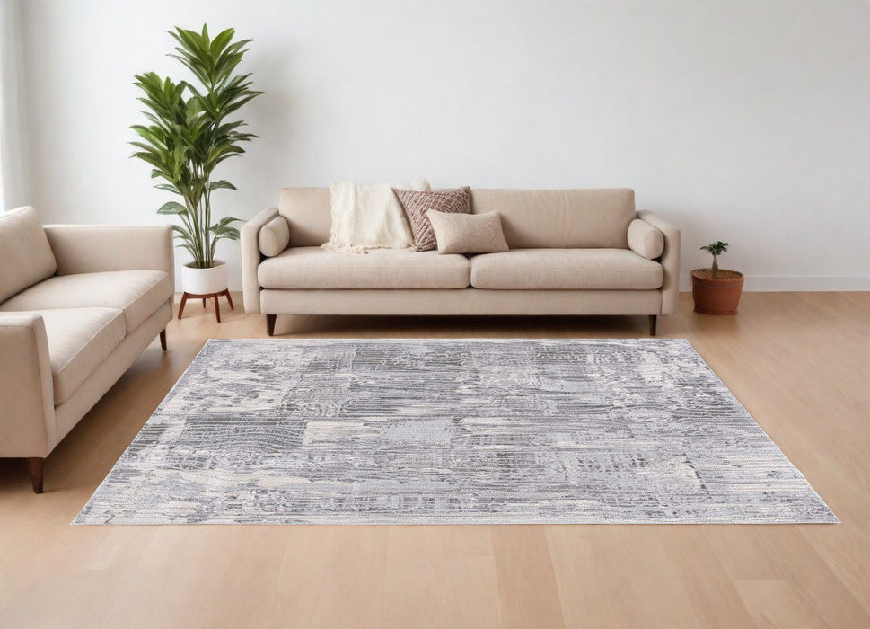 7.7' x 10.7' Abstract Power Loom Area Rug - Blue