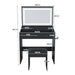 Giga modern makeup vanity set with adjustable lighting, power outlet, and hair dryer holder, featuring sleek mirror and storage.