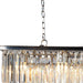 Black metal chandelier with eight lights, crystal accents, and shades, designed as a statement piece for elegant home lighting.