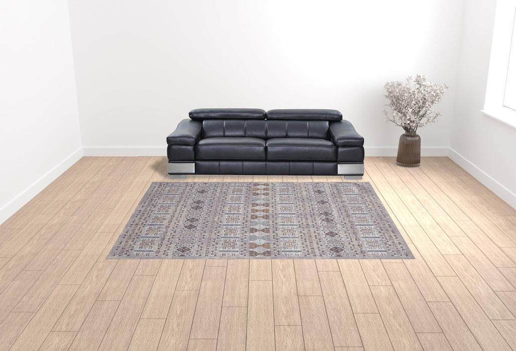 9' x 12' Geometric Power Loom Distressed Stain Resistant Area Rug - Orange Gray And White