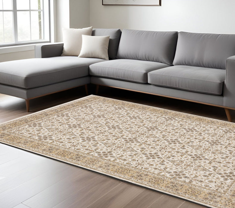 8' x 11' Oriental Power Loom Stain Resistant Polyester Area Rug With Fringe - Ivory And Gold