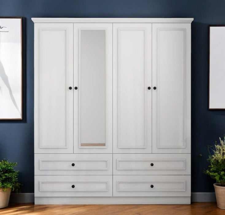 White carved geometric four-door, four-drawer dresser wardrobe by HomeRoots with intricate detailing and modern design.