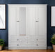 White carved geometric four-door, four-drawer dresser wardrobe by HomeRoots with intricate detailing and modern design.
