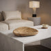 Marble bowl from Meridian Furniture's Whelan collection, showcasing smooth white marble with natural veining, used as a decorative dish.