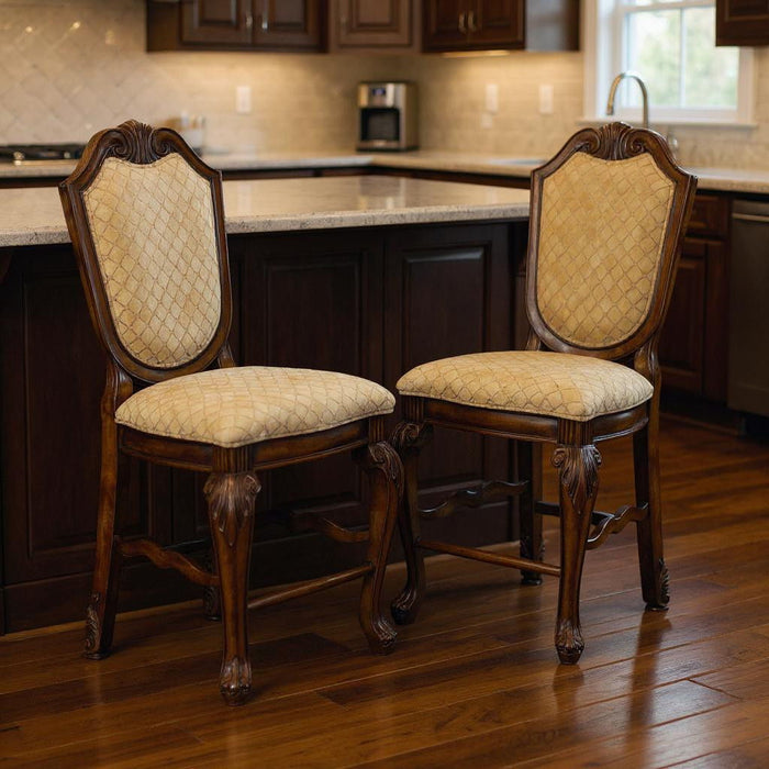 Set of two beige and espresso fabric and solid wood counter height bar chairs by HomeRoots with cushioned seats and wooden legs.