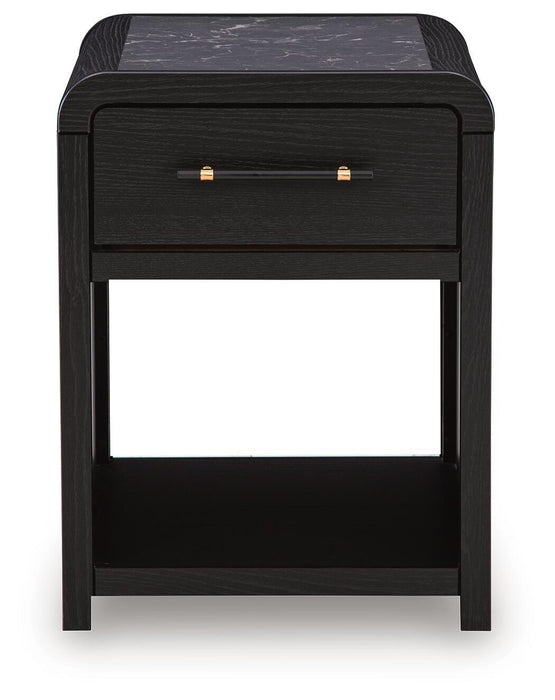 Rectangular cocktail table from Signature Design by Ashley, featuring a sleek wooden surface and modern design.