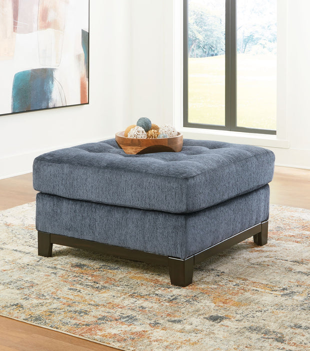 Benchcraft® Maxon Place oversized accent ottoman with plush fabric and modern design, perfect for living room or bedroom decor.