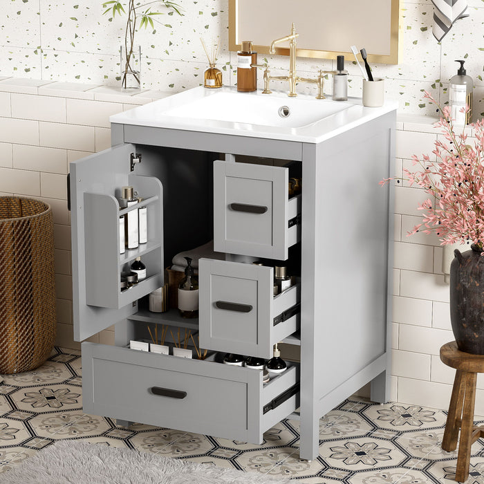 Gray Giga bathroom vanity with sink, soft-close door, double-layer shelf, and three drawers, showcasing modern bathroom storage.