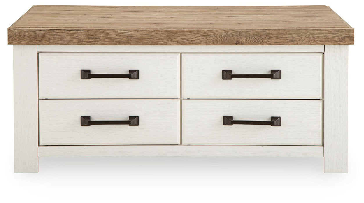 Rectangular cocktail table from Signature Design by Ashley® Savonport collection with a sleek wooden finish.
