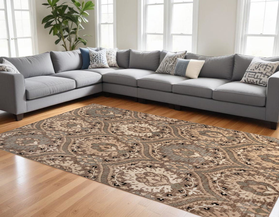 9' x 12' Floral Power Loom Stain Resistant Area Rug - Light Blue