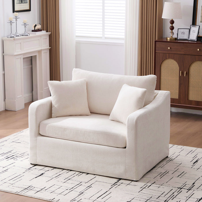 Giga farmhouse accent arm chair with wooden legs, featuring two bolster pillows and cozy, rustic-style upholstery.
