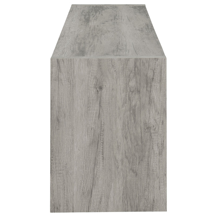 Grey driftwood CoasterEssence Burke 2-door engineered wood TV stand, 71 inches wide, with storage compartments and modern design.