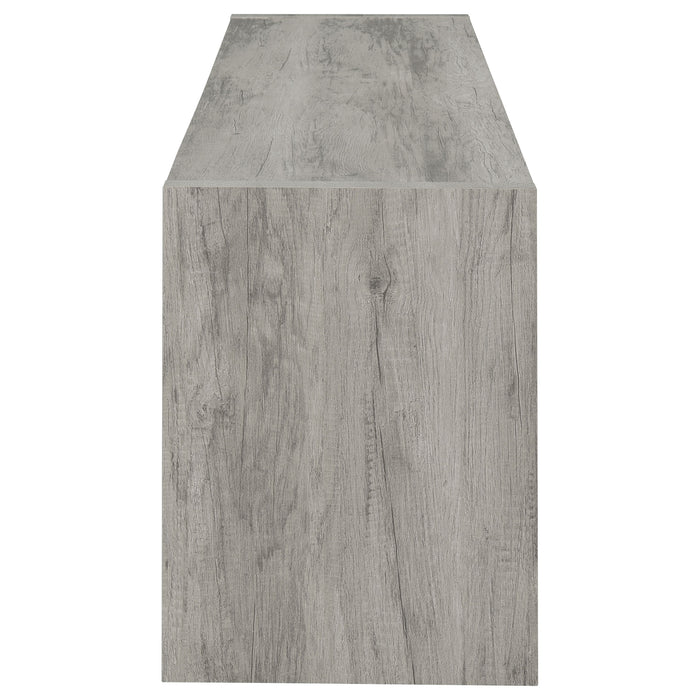 Grey driftwood Burke 2-door engineered wood TV stand by CoasterEssence, 71-inch wide with sleek storage compartments.