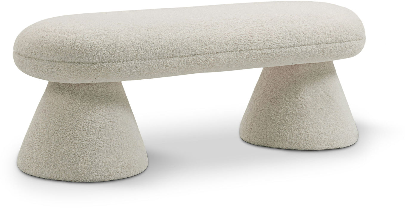 Upholstered drum bench by Meridian Furniture with a round cushioned seat and wooden legs, ideal for living room or entryway decor.
