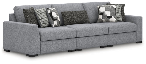 Benchcraft Bealton 3-piece stationary sectional sofa with plush cushions and fabric upholstery, shown in a modern living room setting.