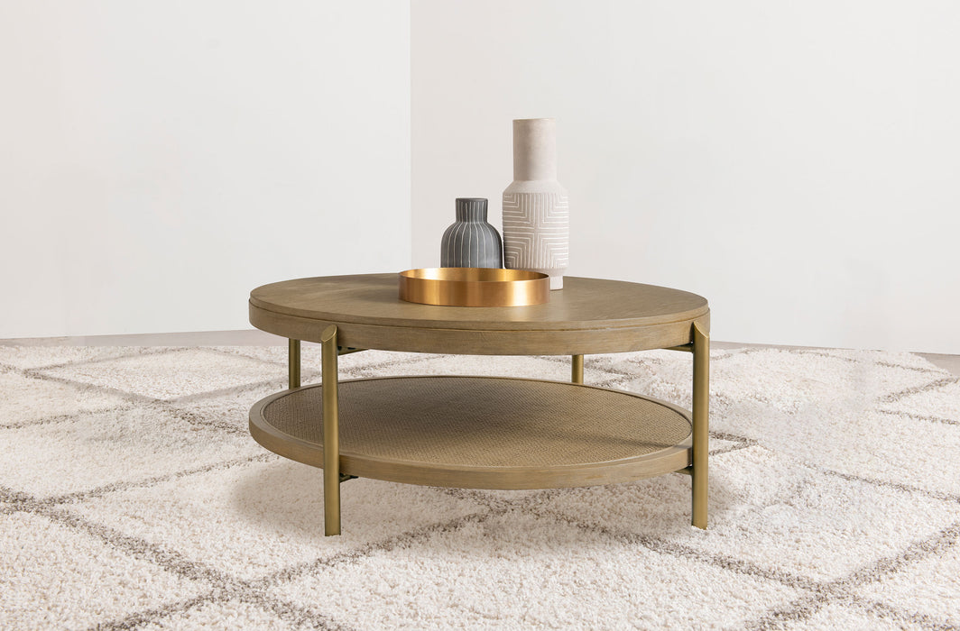 CoasterEveryday Arini round coffee table in sand wash with lower storage shelf