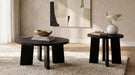 Strouse contemporary round end table in black by CoasterEveryday