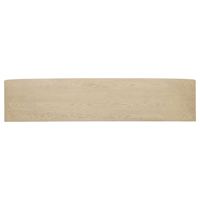 CoasterEveryday Kailani 79-inch beige oak TV stand with four doors and cane accents, perfect for modern living room decor.