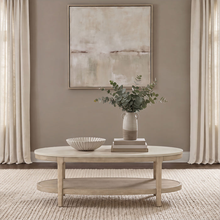 Lucaire oval coffee table by CoasterEveryday with honed cream and sandstone cultured marble top