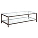 CoasterEssence Trini 1-shelf glass top coffee table in black nickel with sleek metal frame